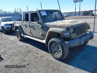 2020 Jeep Gladiator Rubicon with VIN 1C6JJTBGXLL179381, listed as a IAAI auction lot 41351246 with Not Provided miles and . Bid and sale history available at DreamBid. Image 1.