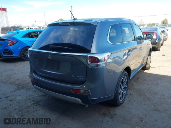2015 Mitsubishi Outlander GT with VIN JA4JZ4AX1FZ005879, listed as a IAAI auction lot 41701299 with 212,805 mi miles and . Bid and sale history available at DreamBid. Image 4.