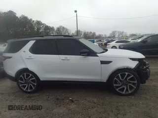 2018 Land Rover Discovery HSE Luxury z VIN SALRT2RV3JA057709, wystawiony jako IAAI lot #41563821 z przebiegiem 99 639 mil mil oraz . Historia ofert i sprzedaży dostępna na DreamBid. Obrazek 14.