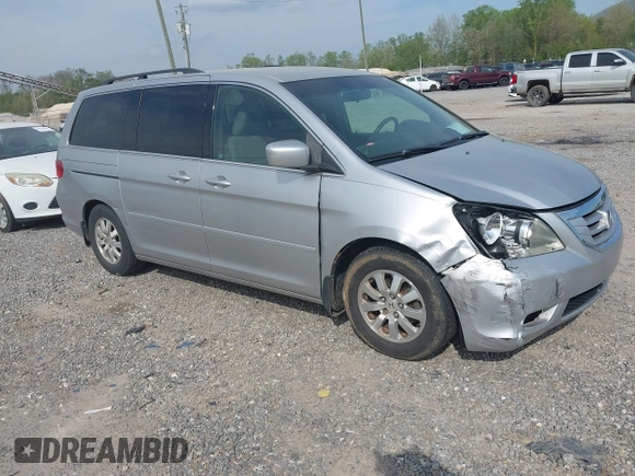 2010 Honda Odyssey EX with VIN 5FNRL3H43AB025629, listed as a IAAI auction lot 42095744 with 209,722 mi miles and . Bid and sale history available at DreamBid. Image 1.