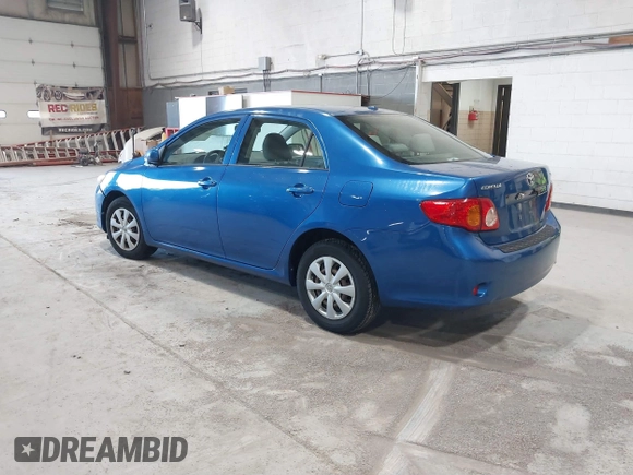 2009 Toyota Corolla with VIN JTDBL40E699037792, listed as a IAAI auction lot 41838231 with 199,690 mi miles. Bid and sale history available at carsss.com. Image 3.