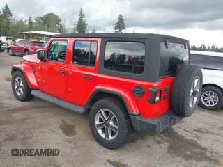 2018 Jeep Wrangler Unlimited Sahara with VIN 1C4HJXEG1JW310817, listed as a IAAI auction lot 42248374 with 64,516 mi miles and . Bid and sale history available at DreamBid. Image 3.