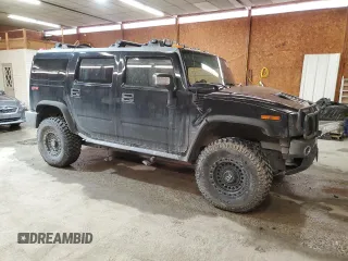 2006 Hummer H2 with VIN 5GRGN23U06H111389, listed as a Copart auction lot 88747715 with 182,628 mi miles and Salvage Title. Bid and sale history available at carsss.com. Image 4.