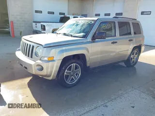 2009 Jeep Patriot Sport with VIN 1J4FT28B59D195435, listed as a IAAI auction lot 40758450 with 130,728 mi miles. Bid and sale history available at carsss.com. Image 2.