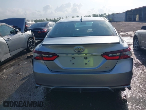 2021 Toyota Camry SE Nightshade with VIN 4T1G11AKXMU599663, listed as a IAAI auction lot 41902392 with 76,909 mi miles. Bid and sale history available at carsss.com. Image 16.