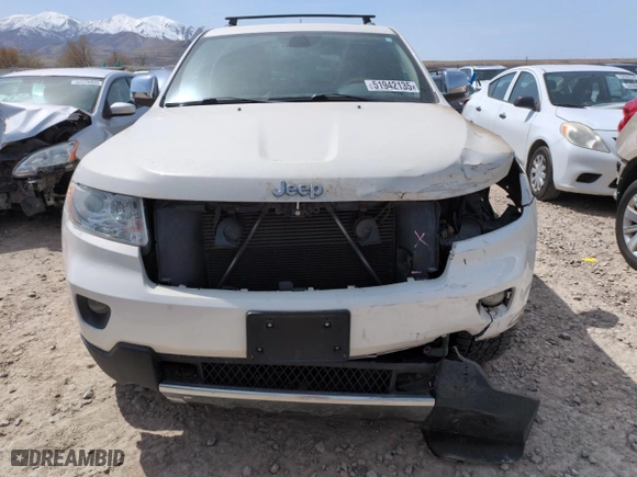 2012 Jeep Grand Cherokee Overland with VIN 1C4RJFCG9CC199486, listed as a Copart auction lot 51942135 with 113,098 mi miles and Salvage Title. Bid and sale history available at carsss.com. Image 5.