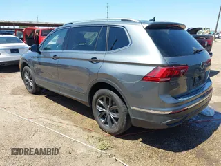 2023 Volkswagen Tiguan SE with VIN 3VVMB7AX4PM023080, listed as a IAAI auction lot 41963195 with 37,696 mi miles and . Bid and sale history available at DreamBid. Image 3.