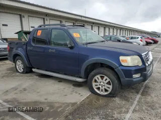 2007 Ford Explorer Sport Trac XLT with VIN 1FMEU51K27UA64546, listed as a Copart auction lot 59719865 with 183,192 mi miles and Salvage title. Bid and sale history available at DreamBid. Image 4.