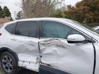 2019 Honda CR-V EX with VIN 5J6RW2H55KL009824, listed as a IAAI auction lot 41921911 with 93,690 mi miles and . Bid and sale history available at DreamBid. Image 13.