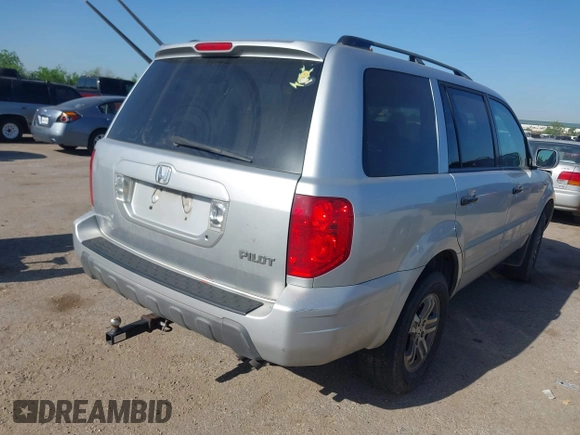 2005 Honda Pilot EX-L with VIN 5FNYF18585B061869, listed as a IAAI auction lot 41982694 with 183,873 mi miles. Bid and sale history available at carsss.com. Image 4.