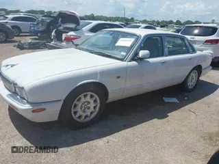 2003 Jaguar XJ 8 with VIN SAJDA14C03LF52338, listed as a IAAI auction lot 42684038 with 142,107 mi miles and . Bid and sale history available at DreamBid. Image 2.