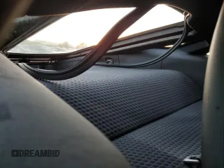 2022 McLaren GT z VIN SBM22GCA4NW001602, wystawiony jako Copart lot #83270334 z przebiegiem 33 668 mil mil oraz Tytuł czysty. Historia ofert i sprzedaży dostępna na DreamBid. Obrazek 10.
