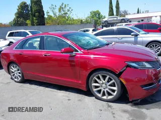 2016 Lincoln MKZ z VIN 3LN6L2G93GR612748, wystawiony jako IAAI lot #42262334 z przebiegiem 72 190 mil mil oraz . Historia ofert i sprzedaży dostępna na DreamBid. Obrazek 13.