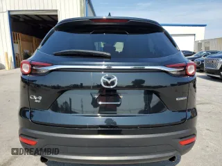 2023 Mazda CX-9 Touring Plus with VIN JM3TCBAY3P0657042, listed as a Copart auction lot 56391575 with 49,780 mi miles and Clean title. Bid and sale history available at DreamBid. Image 6.