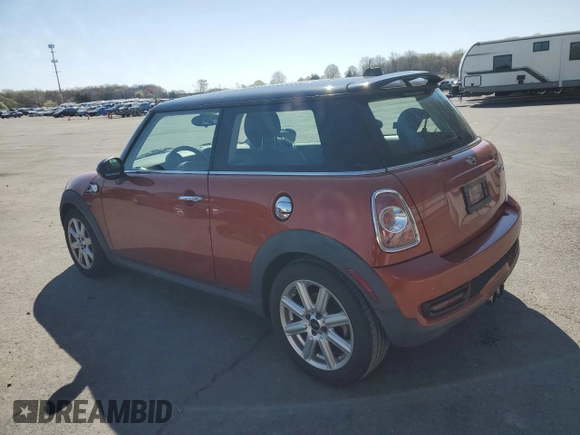 2011 MINI Hardtop S with VIN WMWSV3C57BTY11831, listed as a Copart auction lot 51985845 with 70,690 mi miles and Salvage Title. Bid and sale history available at DreamBid. Image 2.