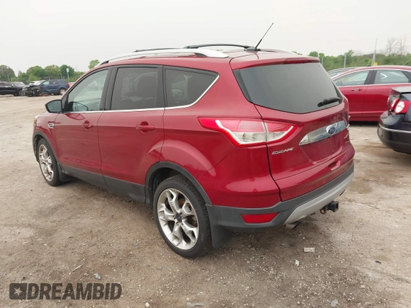 2015 Ford Escape Titanium with VIN 1FMCU9J96FUC02177, listed as a IAAI auction lot 42312928 with 100,716 mi miles and . Bid and sale history available at DreamBid. Image 3.