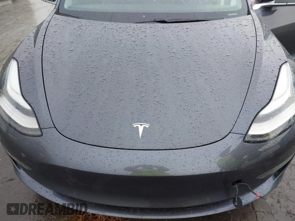 2018 Tesla Model 3 Long Range Battery with VIN 5YJ3E1EB7JF114305, listed as a IAAI auction lot 41765994 with 76,945 mi miles and . Bid and sale history available at DreamBid. Image 10.