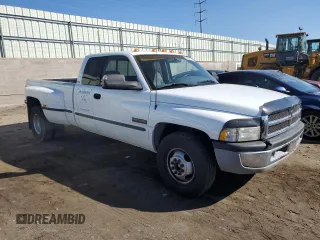 1998 Dodge 3500 with VIN 1B7MC3362WJ224089, listed as a Copart auction lot 69659134 with 108,314 mi miles and Salvage Title. Bid and sale history available at carsss.com. Image 4.