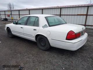 2002 Mercury Grand Marquis GS with VIN 2MEFM74WX2X601019, listed as a IAAI auction lot 41766017 with 271,421 mi miles. Bid and sale history available at carsss.com. Image 3.