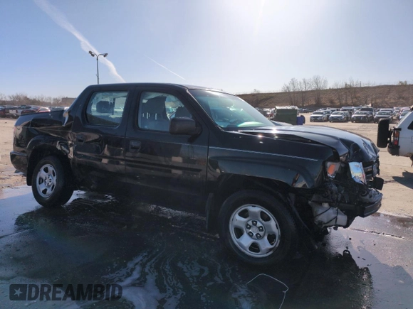 2011 Honda Ridgeline RT z VIN 5FPYK1F24BB009159, wystawiony jako Copart lot #51923715 z przebiegiem 121 639 mil mil oraz Szkoda całkowita • Salvage title. Historia ofert i sprzedaży dostępna na DreamBid. Obrazek 4.
