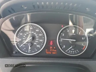2012 BMW X5 35i z VIN 5UXZV4C54CL990840, wystawiony jako Copart lot #57715245 z przebiegiem 166 192 mil mil oraz Szkoda całkowita • Salvage title. Historia ofert i sprzedaży dostępna na DreamBid. Obrazek 9.
