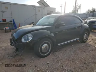2012 Volkswagen Beetle 2.5L w/Sound/Nav PZEV with VIN 3VWJP7AT5CM617460, listed as a Copart auction lot 84972374 with 144,080 mi miles and Salvage Title. Bid and sale history available at DreamBid. Image 1.