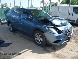 2014 Mazda CX-9 Touring with VIN JM3TB3CV7E0440747, listed as a IAAI auction lot 42457709 with 166,588 mi miles and . Bid and sale history available at DreamBid. Image 1.