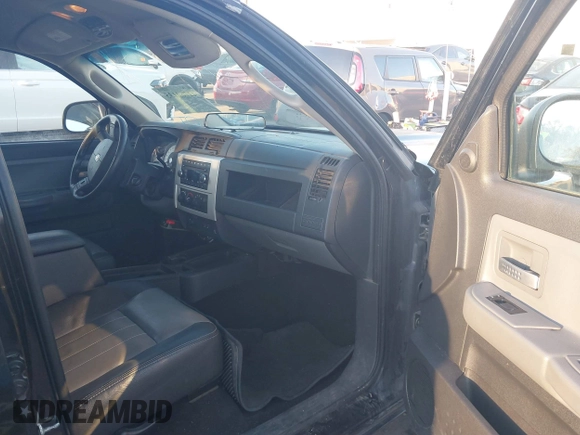 2008 Dodge Dakota Laramie with VIN 1D7HW58N18S593890, listed as a IAAI auction lot 41762135 with 109,669 mi miles. Bid and sale history available at carsss.com. Image 5.