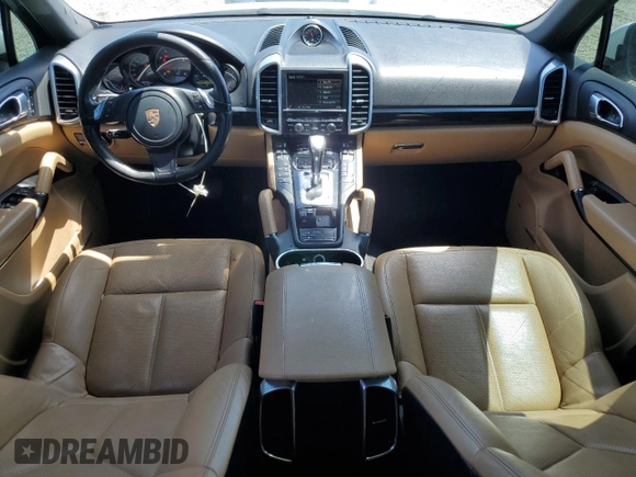 2014 Porsche Cayenne with VIN WP1AA2A28ELA09742, listed as a Copart auction lot 61779285 with 182,380 mi miles and Salvage title. Bid and sale history available at DreamBid. Image 8.