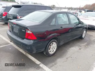2005 Ford Focus S with VIN 1FAFP34N75W304479, listed as a IAAI auction lot 41117405 with 234,312 mi miles. Bid and sale history available at carsss.com. Image 4.