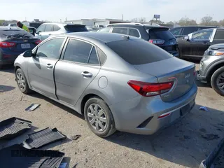 2023 Kia Rio S with VIN 3KPA24AD2PE539471, listed as a IAAI auction lot 41795355 with 30,328 mi miles. Bid and sale history available at carsss.com. Image 3.