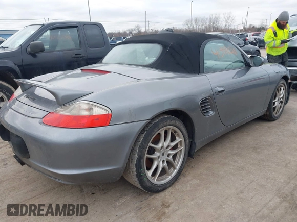 2003 Porsche Boxster with VIN WP0CA29813U621288, listed as a IAAI auction lot 41471740 with 107,864 mi miles. Bid and sale history available at carsss.com. Image 4.