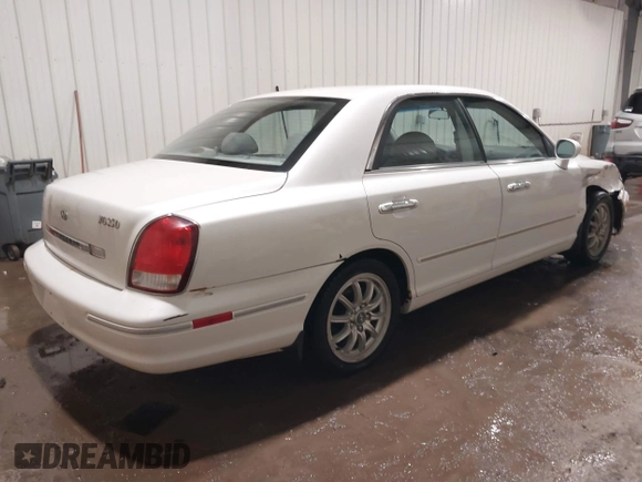2002 Hyundai XG L z VIN KMHFU45EX2A180204, wystawiony jako IAAI lot #41472564 z przebiegiem 148 333 mil mil oraz . Historia ofert i sprzedaży dostępna na DreamBid. Obrazek 4.