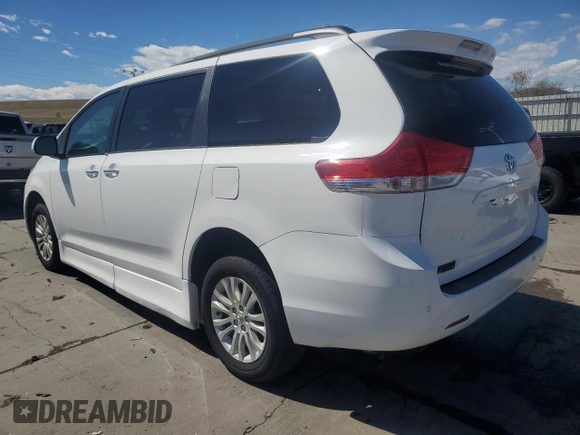 2011 Toyota Sienna XLE AAS with VIN 5TDYK3DC7BS007529, listed as a Copart auction lot 49642475 with 115,117 mi miles and Salvage Title. Bid and sale history available at carsss.com. Image 2.