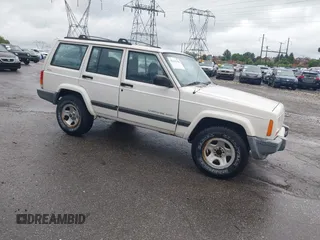 2001 Jeep Cherokee Sport z VIN 1J4FF48S51L573573, wystawiony jako IAAI lot #42242460 z przebiegiem 148 236 mil mil oraz . Historia ofert i sprzedaży dostępna na DreamBid. Obrazek 1.