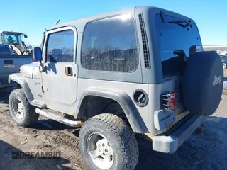 2002 Jeep Wrangler Sport with VIN 1J4FA49SX2P732367, listed as a IAAI auction lot 41805923 with 204,757 mi miles. Bid and sale history available at carsss.com. Image 14.