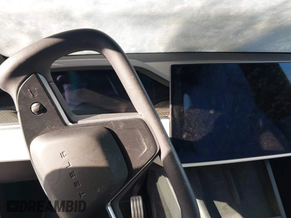 2022 Tesla Model X Plaid z VIN 7SAXCBE69NF343318, wystawiony jako IAAI lot #41387403 z przebiegiem Nie podano mil oraz . Historia ofert i sprzedaży dostępna na DreamBid. Obrazek 18.