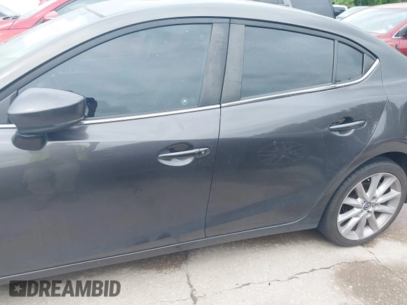2017 Mazda 3 Touring with VIN 3MZBN1V74HM121397, listed as a IAAI auction lot 42143495 with 194,122 mi miles and . Bid and sale history available at DreamBid. Image 14.