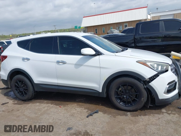 2017 Hyundai Santa Fe 2.4L z VIN 5XYZTDLB3HG439072, wystawiony jako IAAI lot #42061127 z przebiegiem 145 864 mil mil oraz . Historia ofert i sprzedaży dostępna na DreamBid. Obrazek 14.