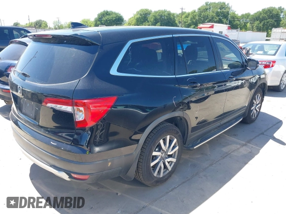 2019 Honda Pilot EX-L with VIN 5FNYF5H56KB042918, listed as a IAAI auction lot 42040516 with 113,433 mi miles and . Bid and sale history available at DreamBid. Image 4.