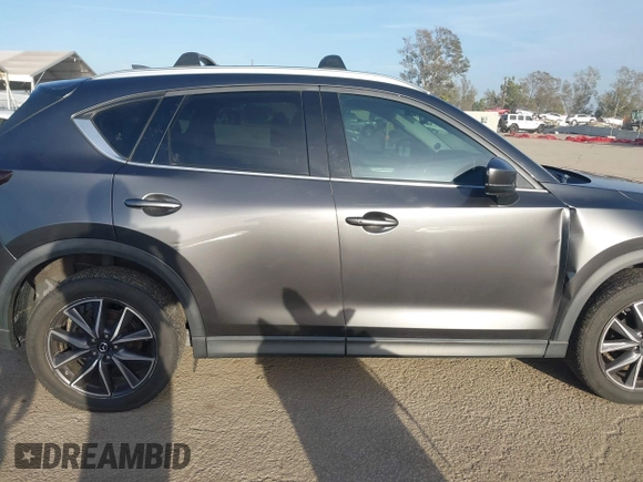 2018 Mazda CX-5 Grand Touring with VIN JM3KFBDM0J0405574, listed as a IAAI auction lot 41725319 with 44,380 mi miles. Bid and sale history available at carsss.com. Image 13.