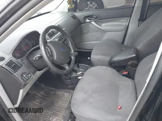 2007 Ford Focus S with VIN 1FAHP37N77W269045, listed as a IAAI auction lot 41877119 with 221,805 mi miles and . Bid and sale history available at carsss.com. Image 5.