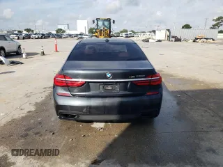 2016 BMW 7 Series 750i с VIN WBA7F0C53GGL99425, выставлен на аукционе Copart как лот 59640465 с пробегом Не указан миль и Чистый • Clean title. История ставок и продаж доступна на DreamBid. Изображение 6.