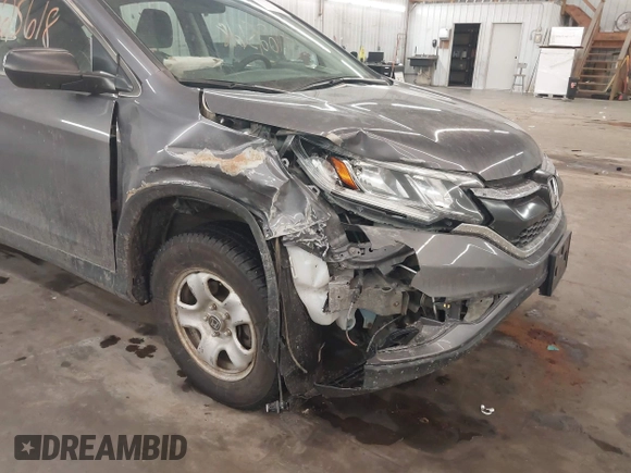 2016 Honda CR-V LX with VIN 5J6RM4H36GL104593, listed as a IAAI auction lot 41625618 with 135,780 mi miles. Bid and sale history available at carsss.com. Image 6.