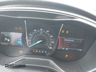 2016 Ford Fusion Titanium with VIN 3FA6P0K93GR117587, listed as a IAAI auction lot 42079701 with 142,105 mi miles. Bid and sale history available at carsss.com. Image 7.
