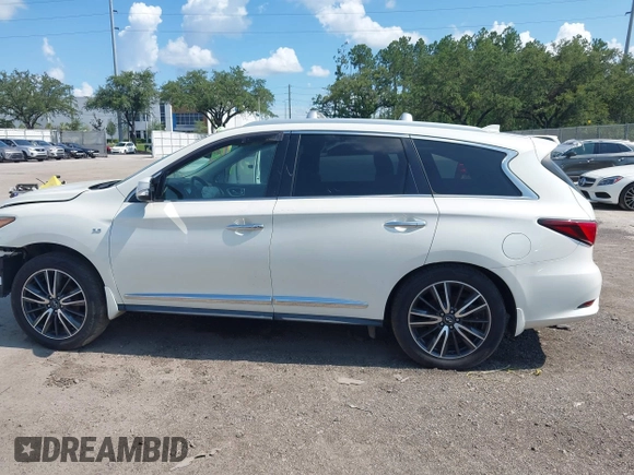 2019 Infiniti QX60 Pure with VIN 5N1DL0MN6KC508551, listed as a IAAI auction lot 42577741 with 130,937 mi miles and . Bid and sale history available at DreamBid. Image 13.