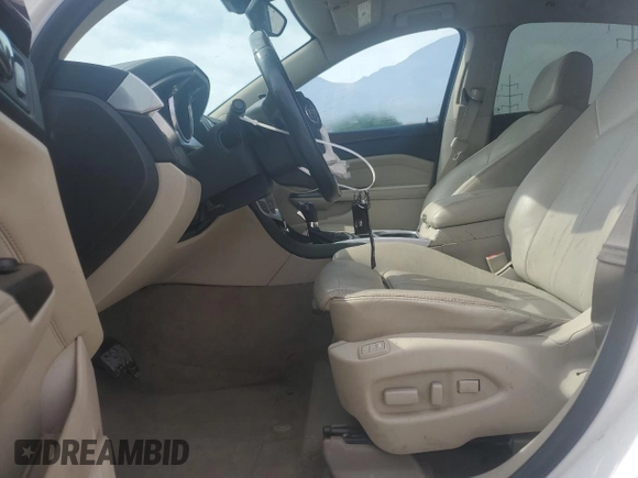 2012 Cadillac SRX Performance Collection z VIN 3GYFNBE32CS615988, wystawiony jako Copart lot #61198415 z przebiegiem 156 135 mil mil oraz Szkoda całkowita • Salvage title. Historia ofert i sprzedaży dostępna na DreamBid. Obrazek 7.