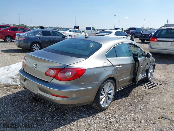 2009 Volkswagen CC VR6 Sport with VIN WVWEU73CX9E514415, listed as a IAAI auction lot 41597199 with 135,041 mi miles. Bid and sale history available at carsss.com. Image 4.
