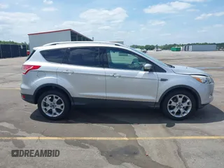 2014 Ford Escape Titanium with VIN 1FMCU0JX7EUA28824, listed as a IAAI auction lot 42065325 with 107,761 mi miles. Bid and sale history available at carsss.com. Image 13.