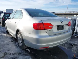 2013 Volkswagen Jetta Sedan S with VIN 3VW2K7AJ1DM288114, listed as a IAAI auction lot 41649329 with 200,736 mi miles. Bid and sale history available at carsss.com. Image 3.